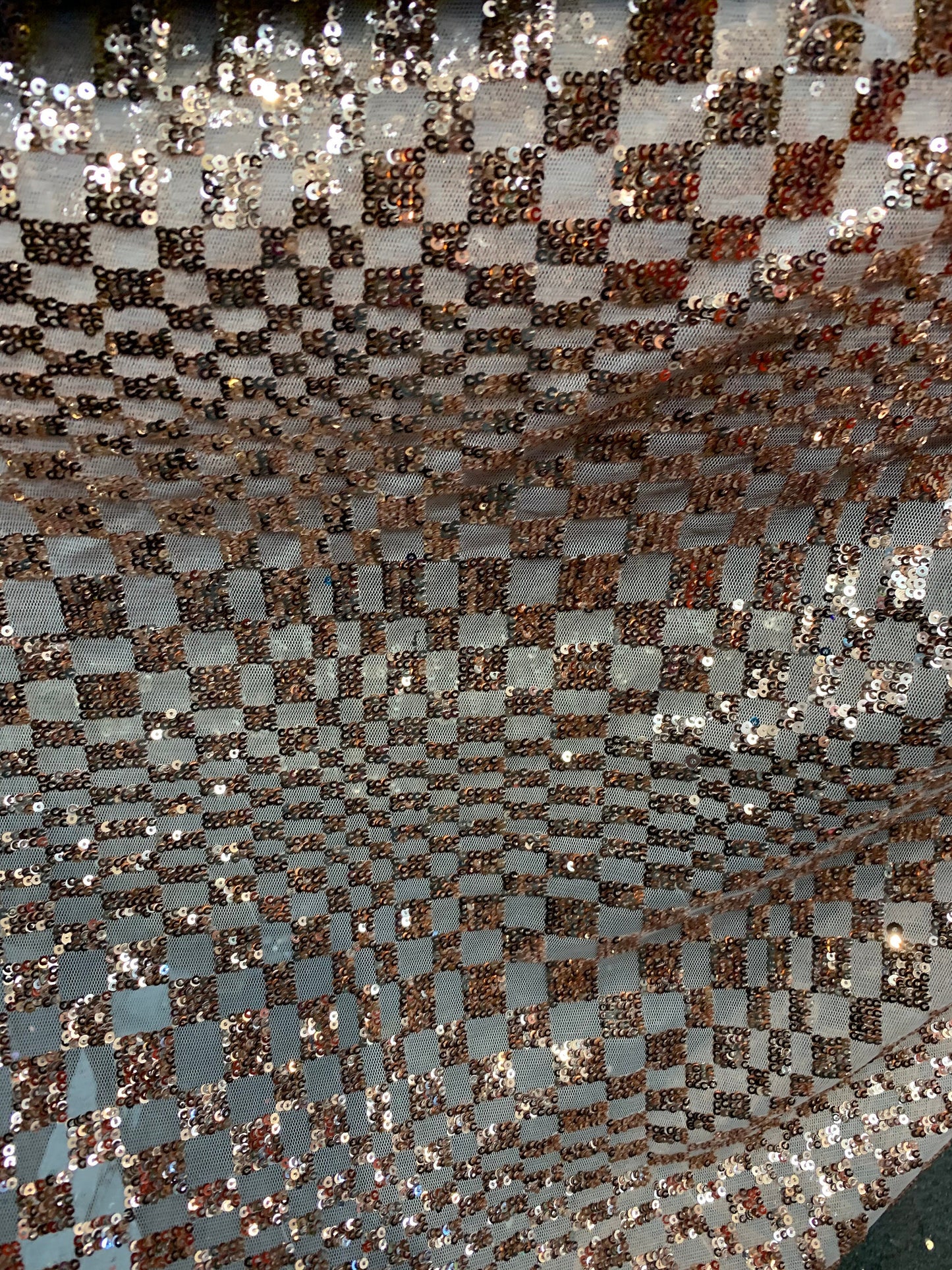 New small checkered design on spandex mesh 2way stretch 58/60" Sold by the YD. Ships worldwide from Los Angeles California USA.
