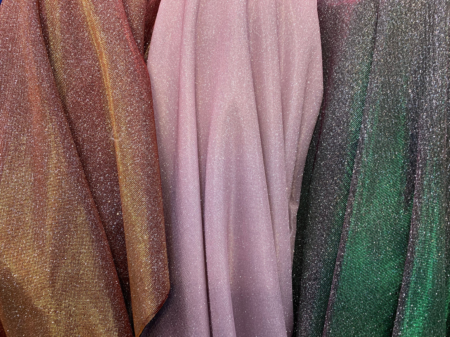 New Iridescent heavy metallic poly super techno fabric 2-way stretch 58/60” Sold by the YD. Ships worldwide from Los Angeles California USA.