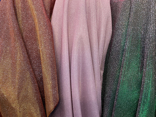 New Iridescent heavy metallic poly super techno fabric 2-way stretch 58/60” Sold by the YD. Ships worldwide from Los Angeles California USA.