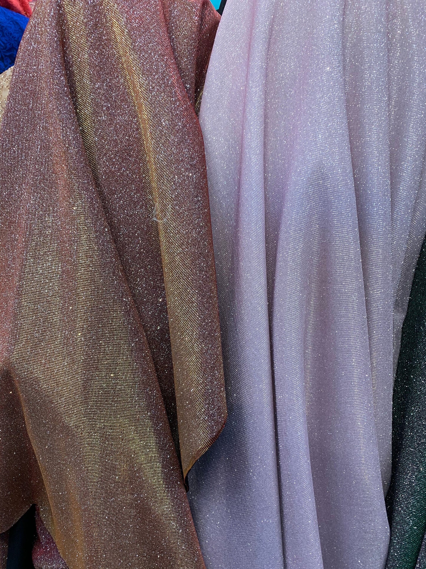New Iridescent heavy metallic poly super techno fabric 2-way stretch 58/60” Sold by the YD. Ships worldwide from Los Angeles California USA.