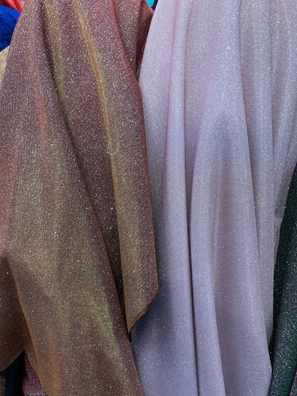 New Iridescent heavy metallic poly super techno fabric 2-way stretch 58/60” Sold by the YD. Ships worldwide from Los Angeles California USA.