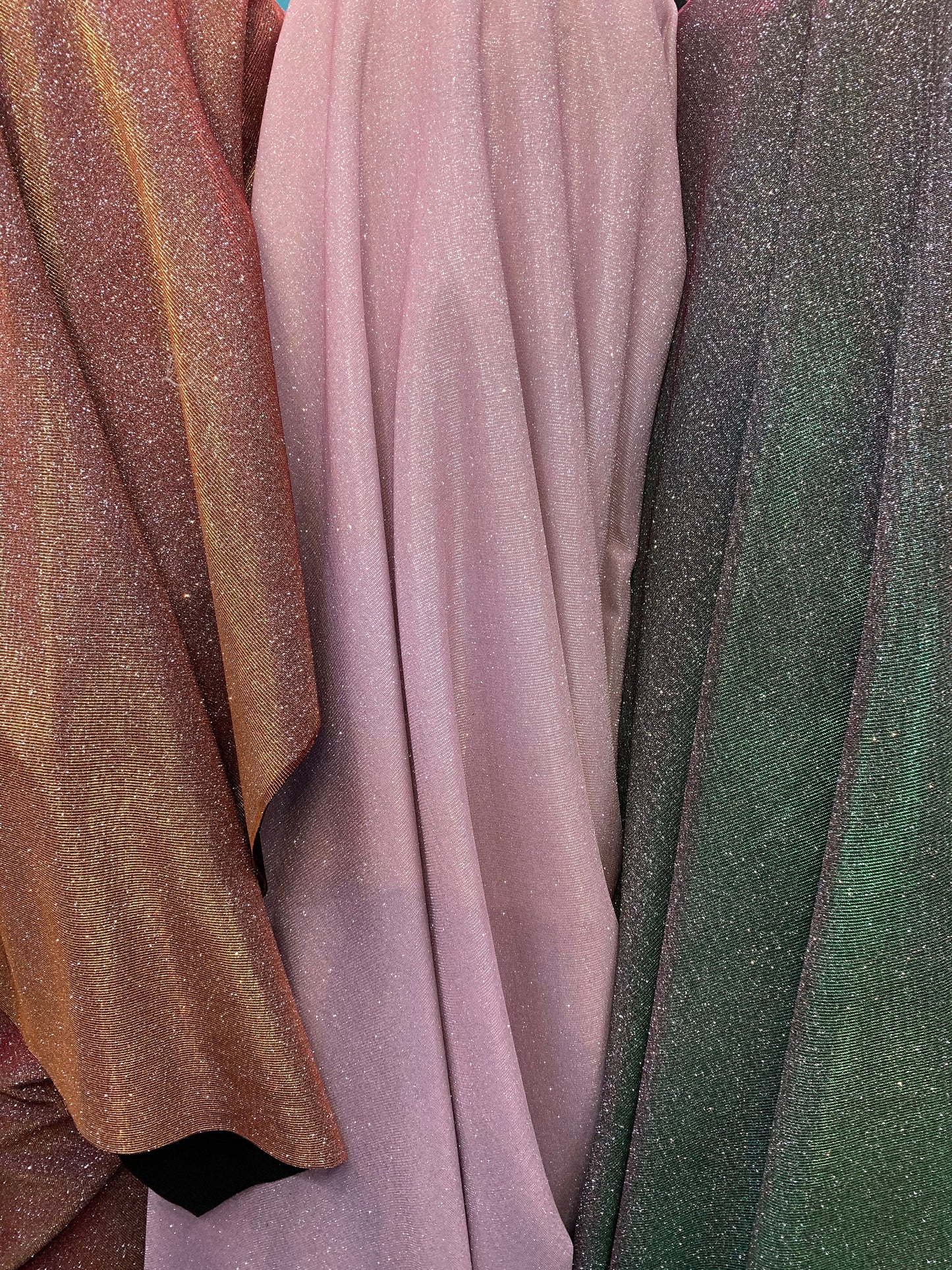 New Iridescent heavy metallic poly super techno fabric 2-way stretch 58/60” Sold by the YD. Ships worldwide from Los Angeles California USA.