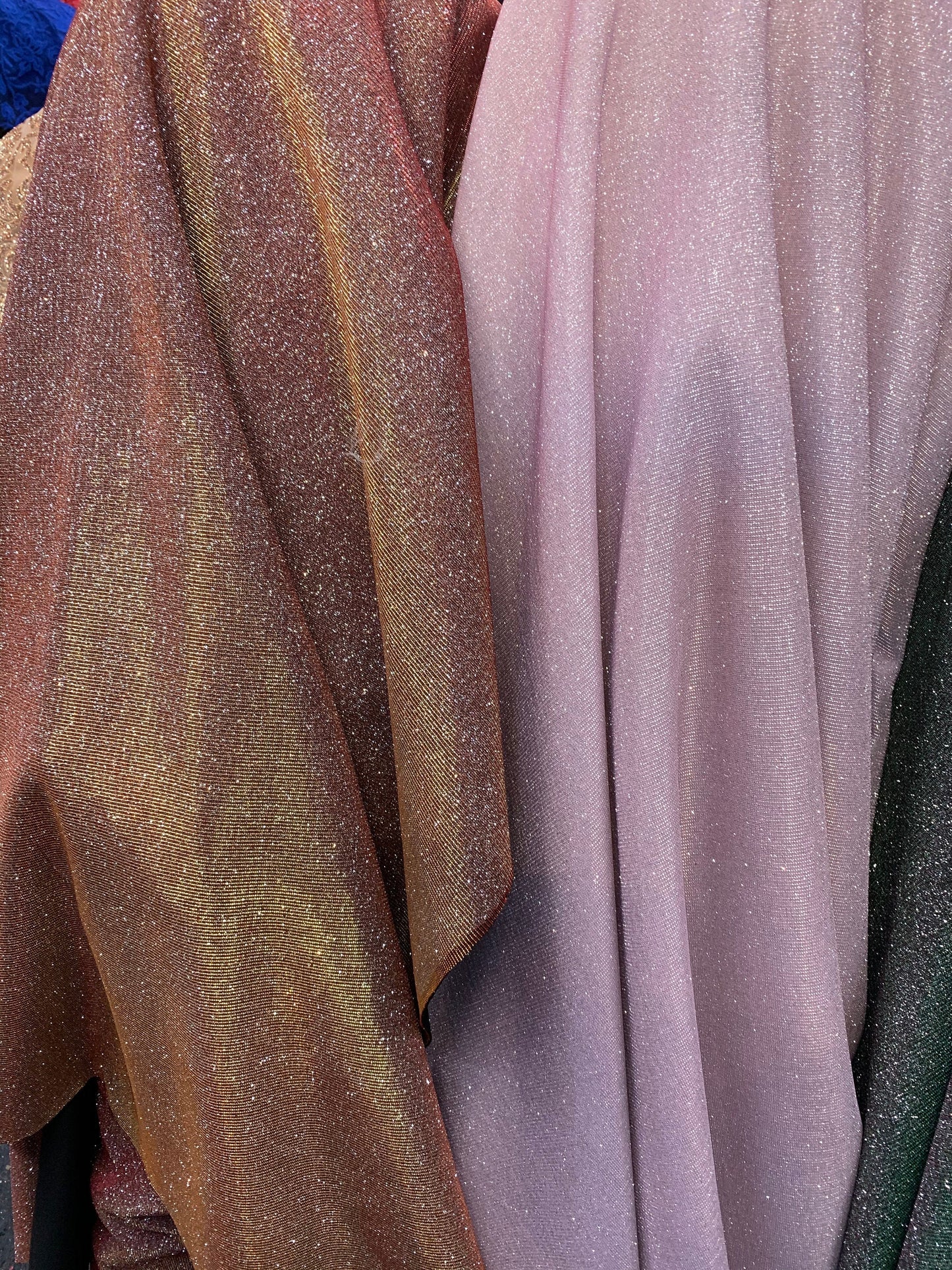 New Iridescent heavy metallic poly super techno fabric 2-way stretch 58/60” Sold by the YD. Ships worldwide from Los Angeles California USA.