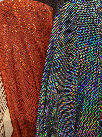 New metallic poly spandex with mini hologram sequins 2-way stretch 58/60” Sold by the YD. Ships worldwide from Los Ángeles California USA.