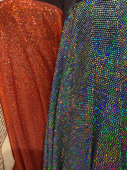 New metallic poly spandex with mini hologram sequins 2-way stretch 58/60” Sold by the YD. Ships worldwide from Los Ángeles California USA.