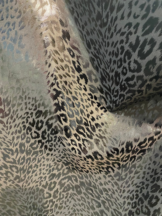New super techno animal print design with foil 2-way stretch 58/60” Sold by the YD. Ships worldwide from Los Angeles California USA.