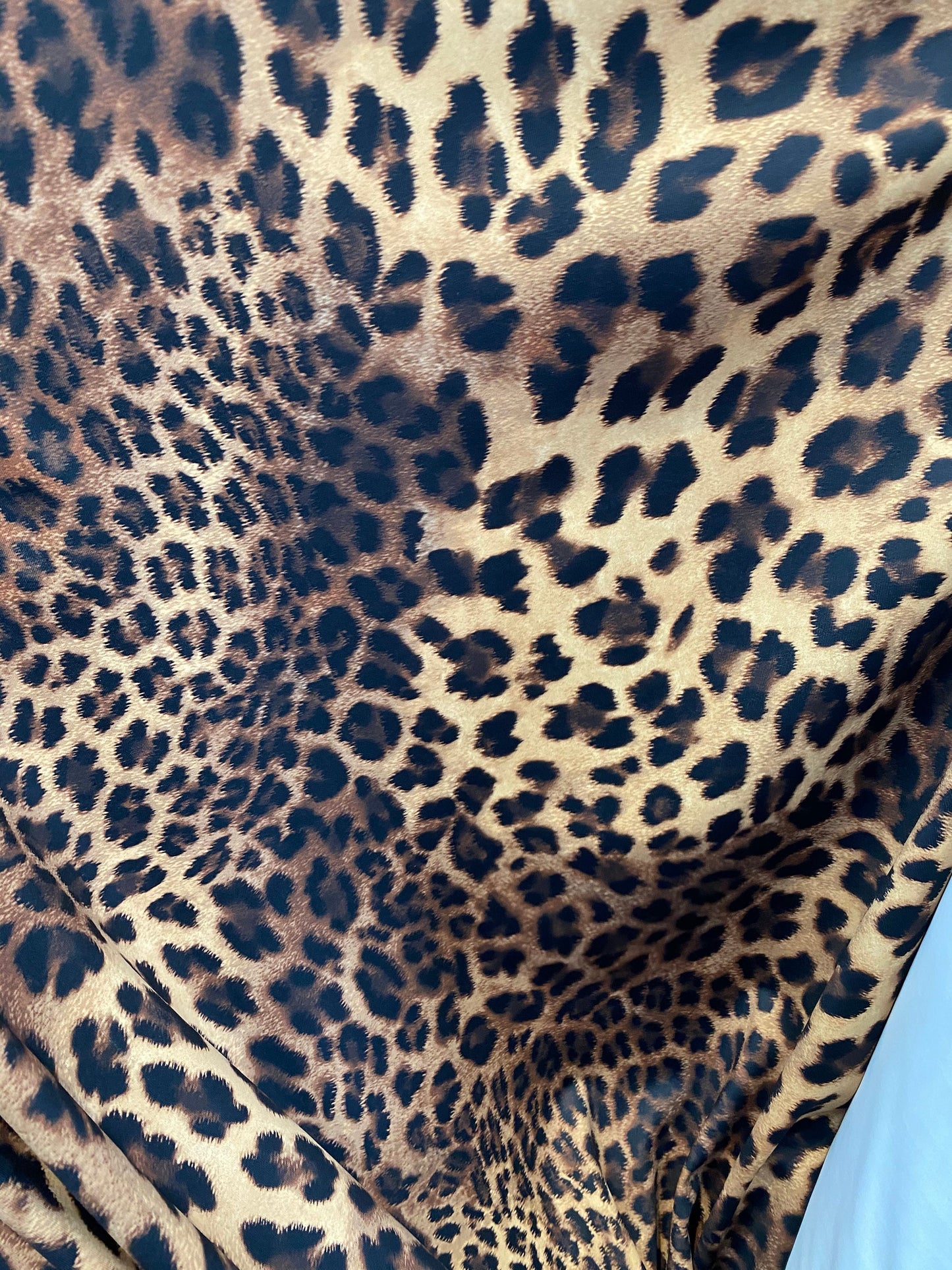 New velvet leopard design brown/taupe 4-way stretch 58/60” Sold by the YD. Ships worldwide from Los Angeles California USA.