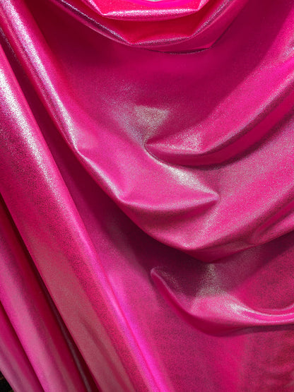 New foggy foil metallic nylon spandex neon pink/silver 4-way stretch 58/60” Sold by the YD. Ships worldwide from Los Angeles California USA.