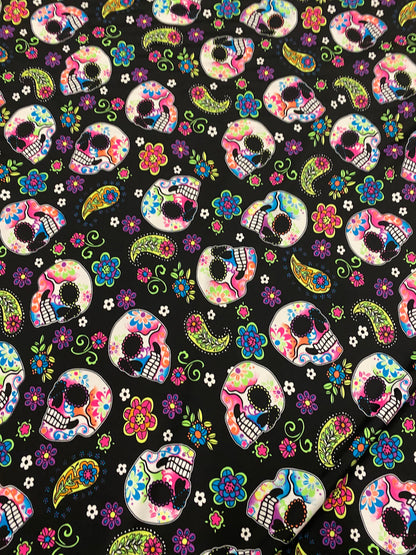 New skulls design black/multicolor nylon spandex print 4-way stretch 58/60”  Sold by the YD. Ships worldwide from Los Ángeles California USA