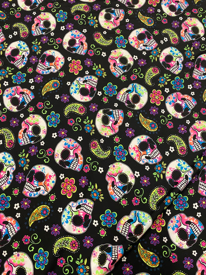 New skulls design black/multicolor nylon spandex print 4-way stretch 58/60”  Sold by the YD. Ships worldwide from Los Ángeles California USA