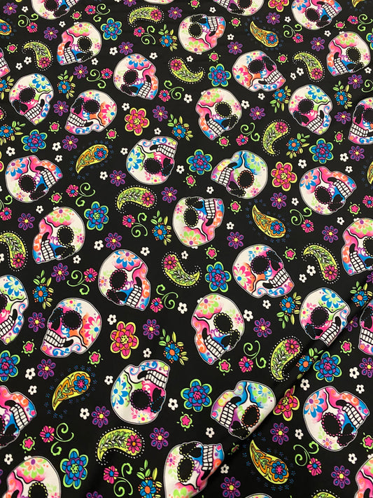 New skulls design black/multicolor nylon spandex print 4-way stretch 58/60”  Sold by the YD. Ships worldwide from Los Ángeles California USA