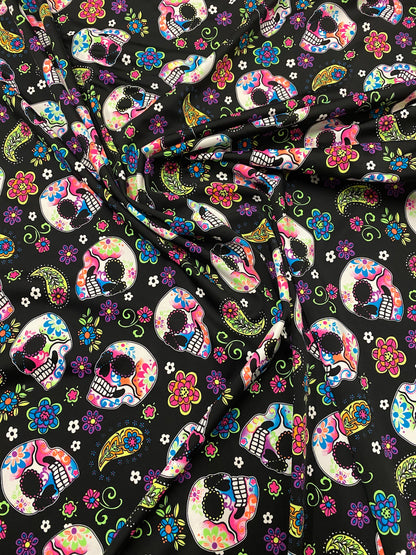 New skulls design black/multicolor nylon spandex print 4-way stretch 58/60”  Sold by the YD. Ships worldwide from Los Ángeles California USA