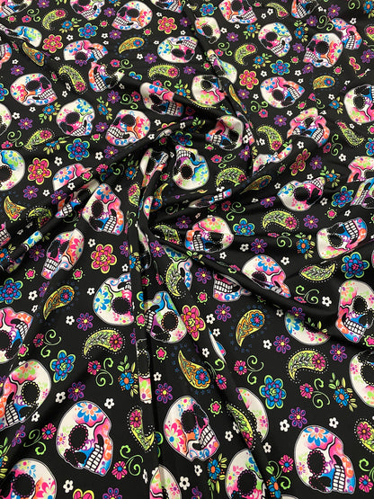 New skulls design black/multicolor nylon spandex print 4-way stretch 58/60”  Sold by the YD. Ships worldwide from Los Ángeles California USA
