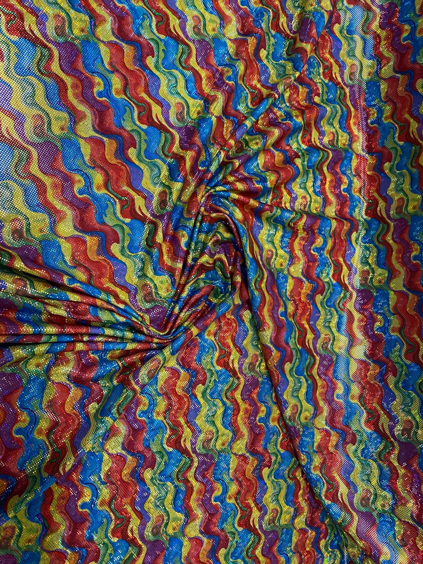 New shattered glass hologram multicolor lava design nylon spandex 4way stretch 58/60” Sold by the YD. Ships worldwide from Los Angeles CA US
