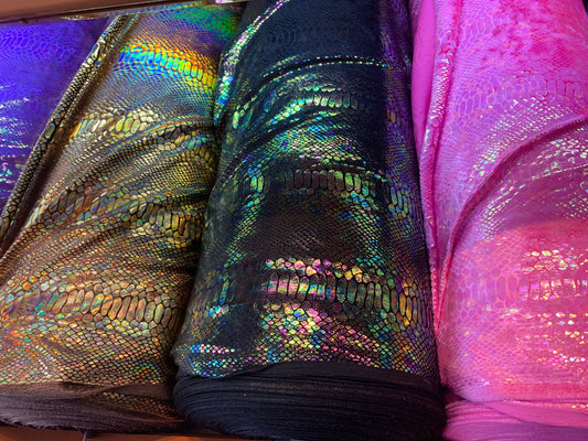 New Iridescent Alligator design hologram clear ilusión foil on heavy stretch velvet 4way stretch 58/60” Sold by the YD. Ships worldwide