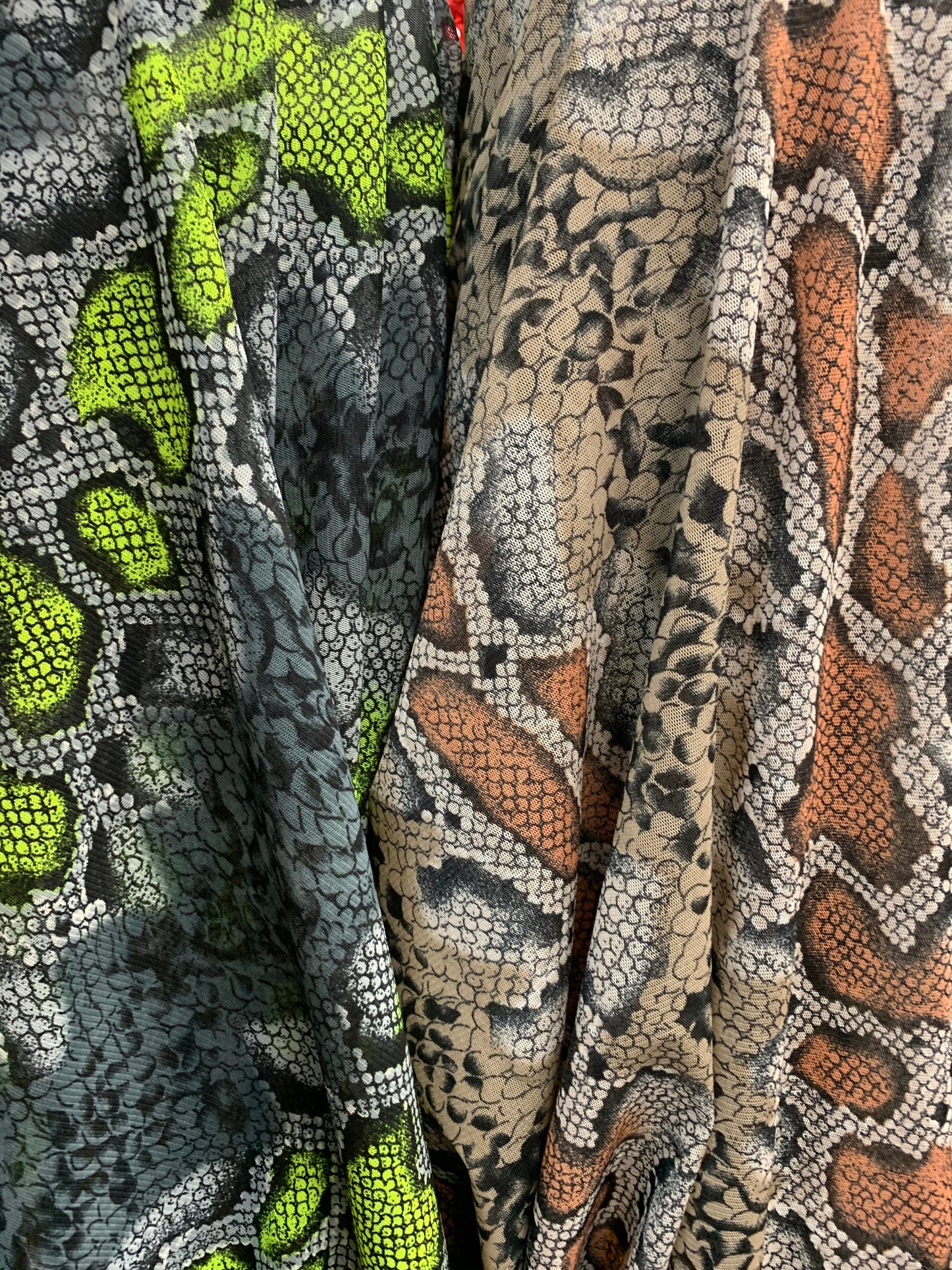 New stretch mesh exotic snake design it glows in the dark 4-way Stretch 58/60” Sold by the YD. Ships worldwide from Los Ángeles California