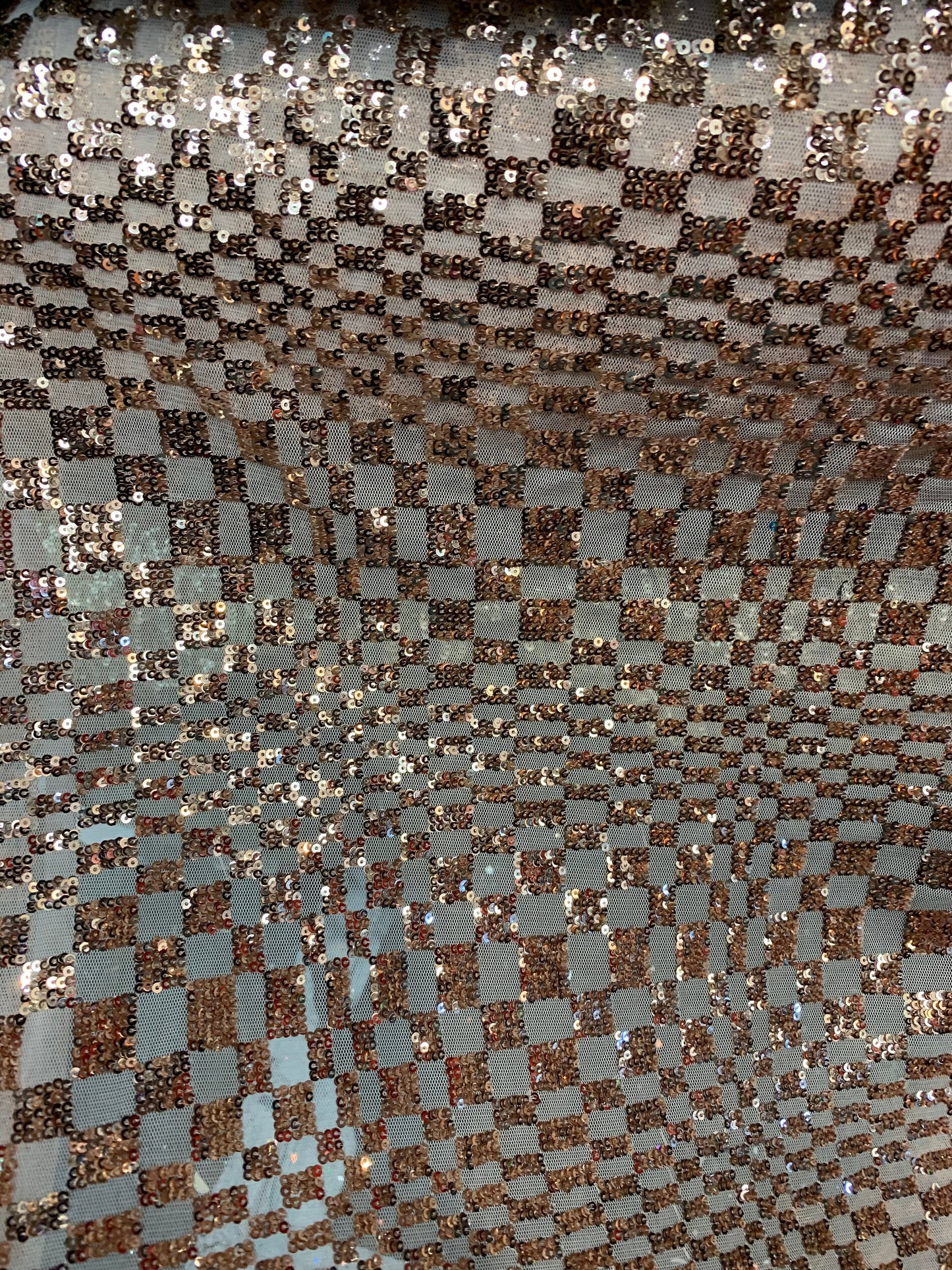 New small checkered design on spandex mesh 2way stretch 58/60" Sold by the YD. Ships worldwide from Los Angeles California USA.