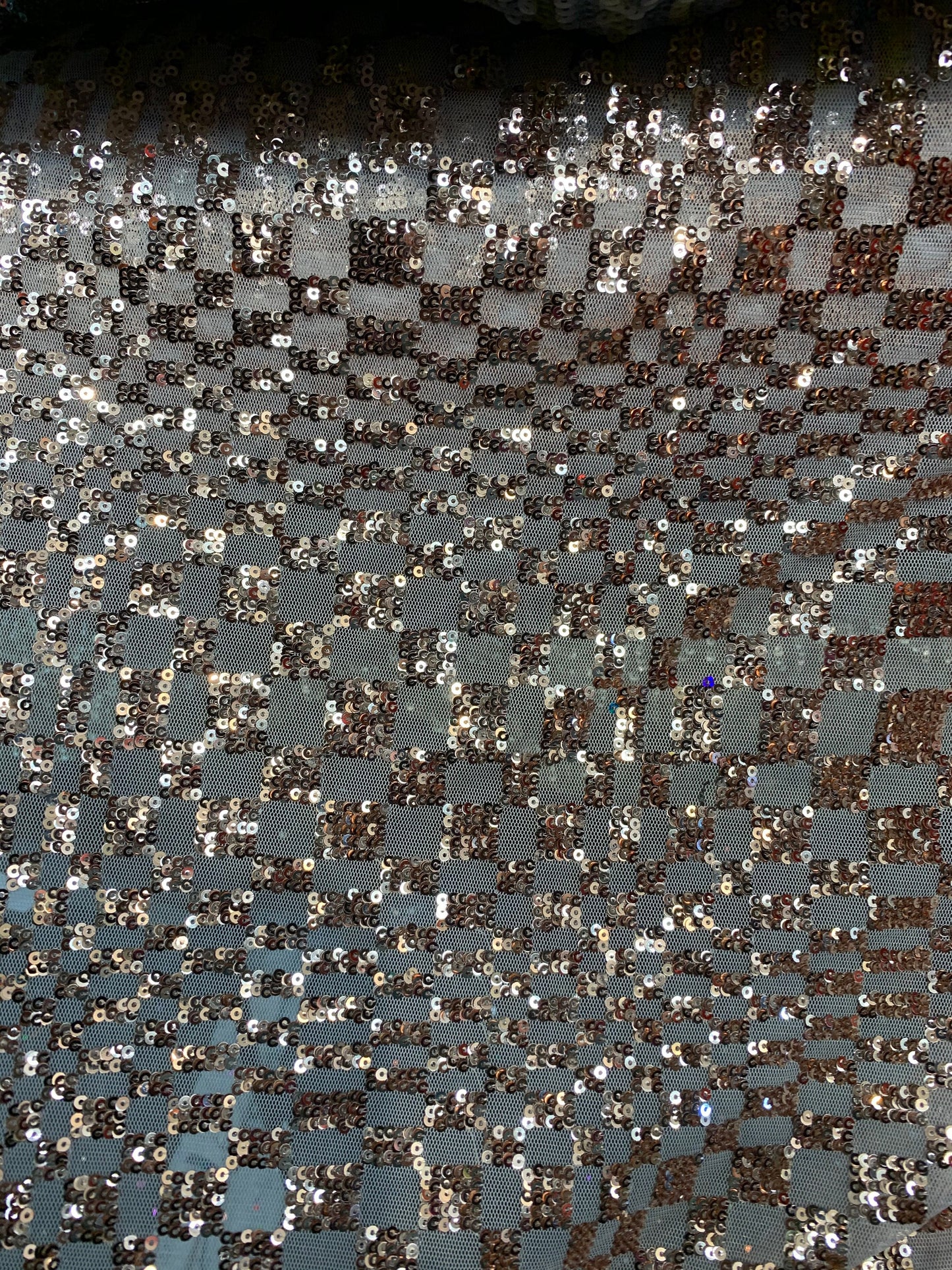 New small checkered design on spandex mesh 2way stretch 58/60" Sold by the YD. Ships worldwide from Los Angeles California USA.