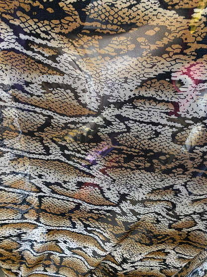 New mesh snake design print on stretch mesh 4-way Sold by the YD. Ships worldwide from Los Angeles California USA.
