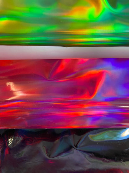 New Luxury Iridescent vinyl medium weight 2-way stretch 58/60”Sold by the YD. Ships worldwide from Los Angeles California USA.