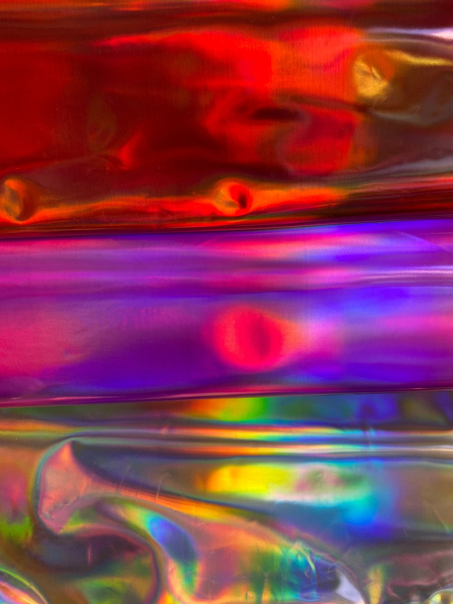 New Luxury Iridescent vinyl medium weight 2-way stretch 58/60”Sold by the YD. Ships worldwide from Los Angeles California USA.