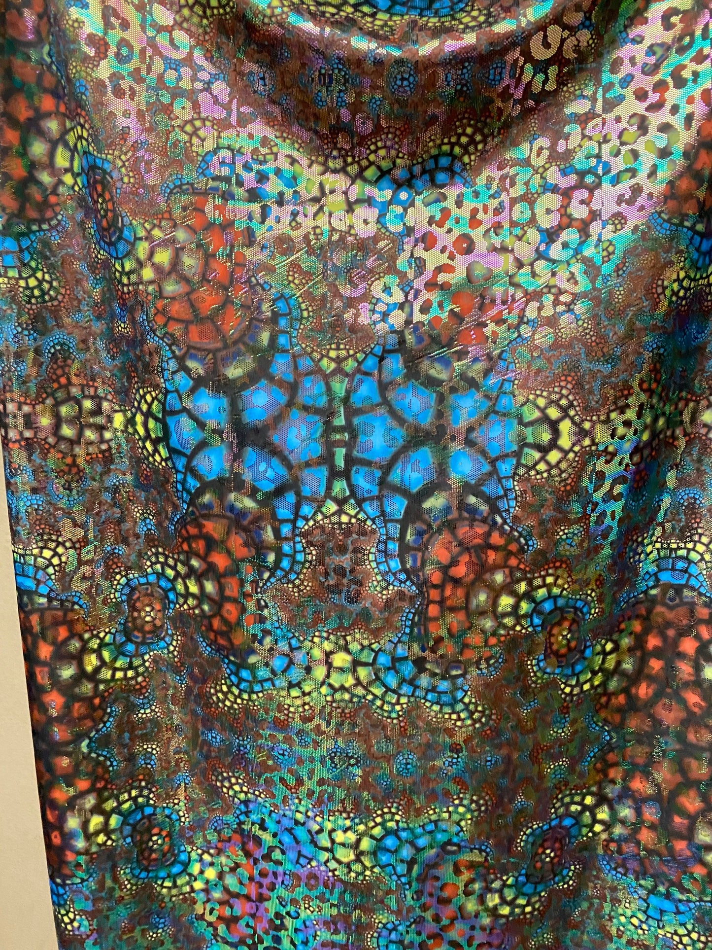 New Exotic Wild animal print design iridescent foil on Nylon spandex 4-way Stretch 58/60” Sold by the YD. Ships worldwide from Los Angeles.