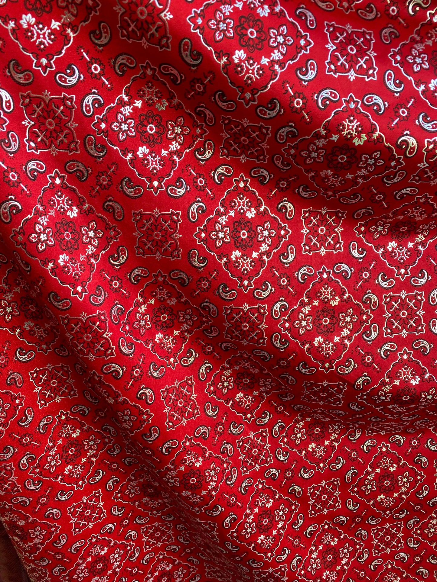 New paisley bandana metallic design print on heavy nylon spandex 4way stretch 58/60” Sold by the YD. Ships worldwide from Los Angeles CA.