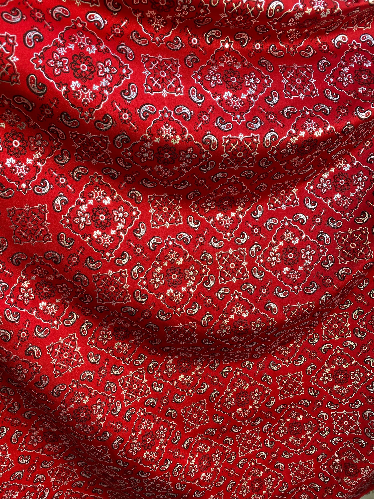 New paisley bandana metallic design print on heavy nylon spandex 4way stretch 58/60” Sold by the YD. Ships worldwide from Los Angeles CA.