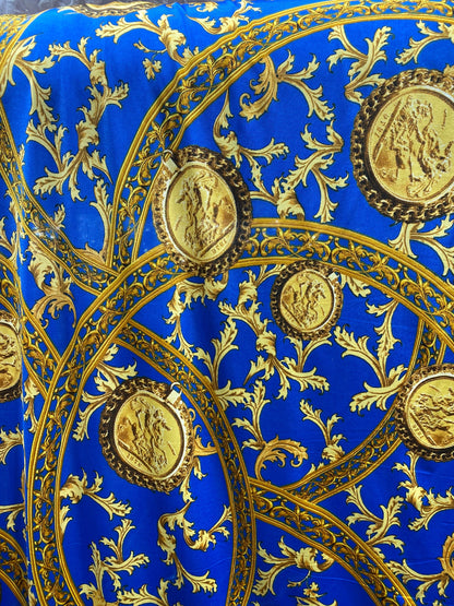New modern print Sapphire/gold poly spandex medium weight 4-way stretch 58/60” Sold by the YD. Ships worldwide from Los Ángeles California.
