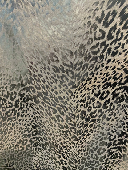 New super techno animal print design with foil 2-way stretch 58/60” Sold by the YD. Ships worldwide from Los Angeles California USA.
