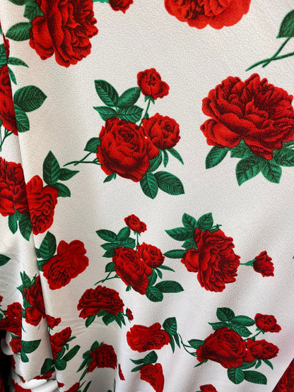 New poly spandex with roses design 4-way stretch 58/60” Sold by the YD. Ships worldwide from Los Angeles California USA.