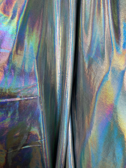 New poly spandex with iridescent metallic foil black/silver 4-way stretch 58/60” Sold by the YD. Ships worldwide from Los Angeles California