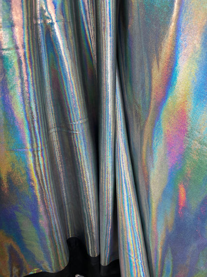 New poly spandex with iridescent metallic foil black/silver 4-way stretch 58/60” Sold by the YD. Ships worldwide from Los Angeles California