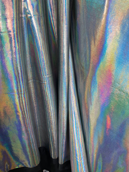 New poly spandex with iridescent metallic foil black/silver 4-way stretch 58/60” Sold by the YD. Ships worldwide from Los Angeles California