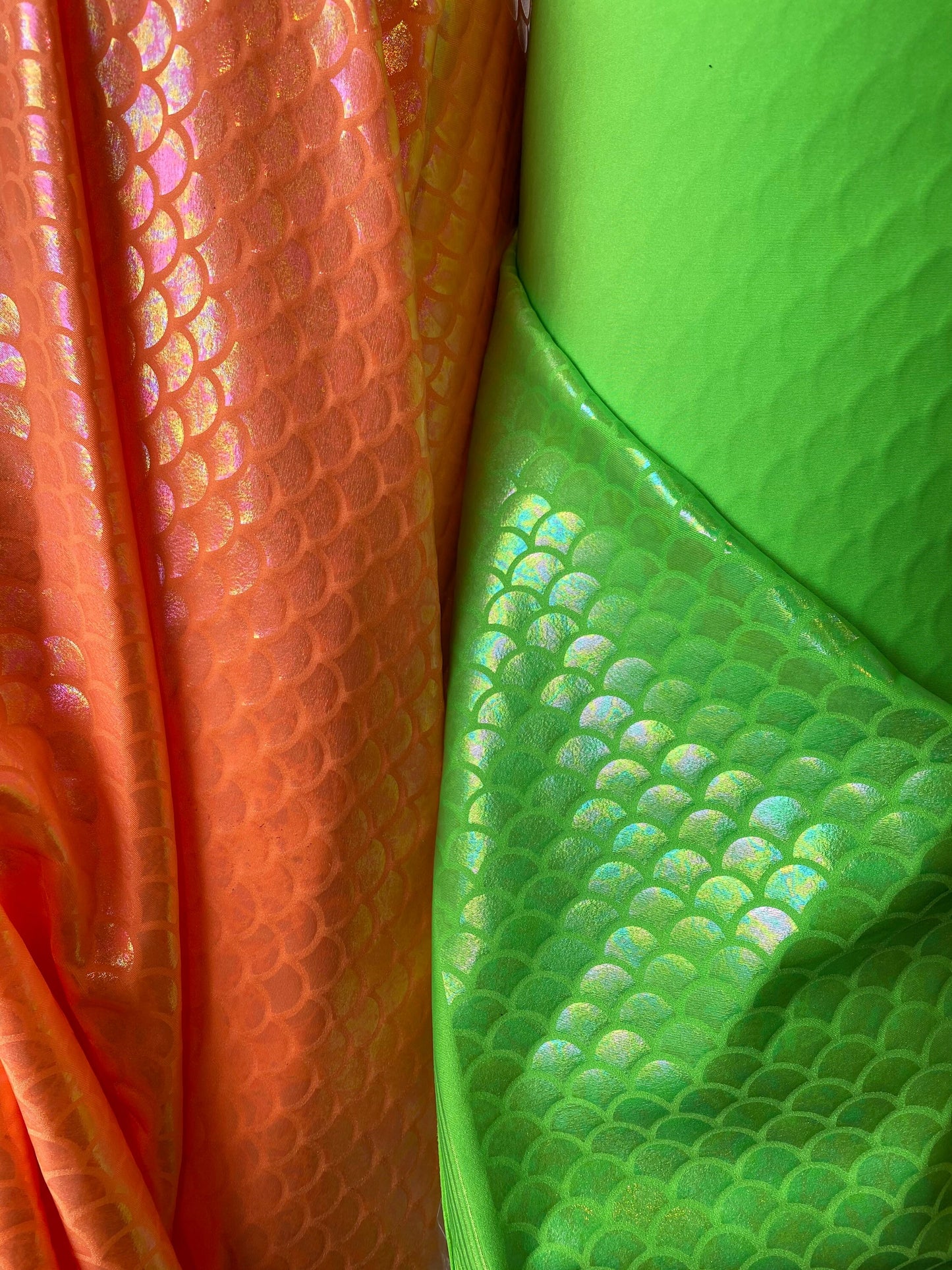 New mermaid with Ilusión Iridescent foil metallic nylon spandex 4-way stretch 58/60” Sold by the YD. Ships worldwide from Los Angeles CA USA