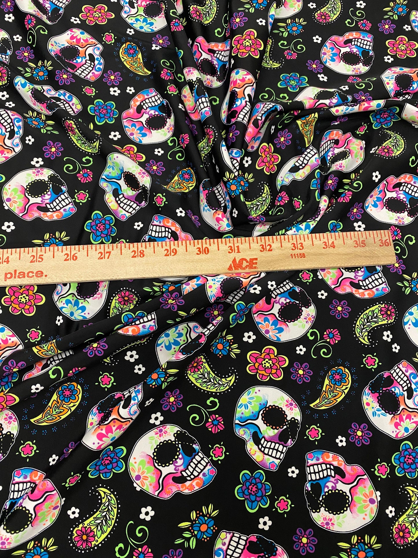 New skulls design black/multicolor nylon spandex print 4-way stretch 58/60”  Sold by the YD. Ships worldwide from Los Ángeles California USA
