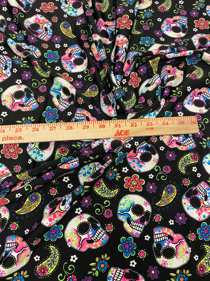 New skulls design black/multicolor nylon spandex print 4-way stretch 58/60”  Sold by the YD. Ships worldwide from Los Ángeles California USA