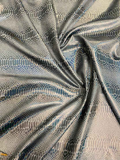 New Iridescent snake design silver/gray metallic hologram nylon spandex 4-way stretch 58/60” Sold by the YD. Ships worldwide from L.A CA.