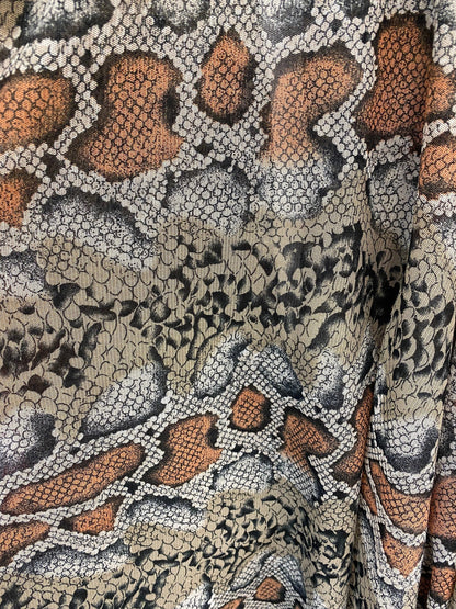 Exotic snake design Nude/black 2-tone print on stretch mesh 4-way 58/60” Sold by the YD. Ships worldwide from Los Angeles California USA.