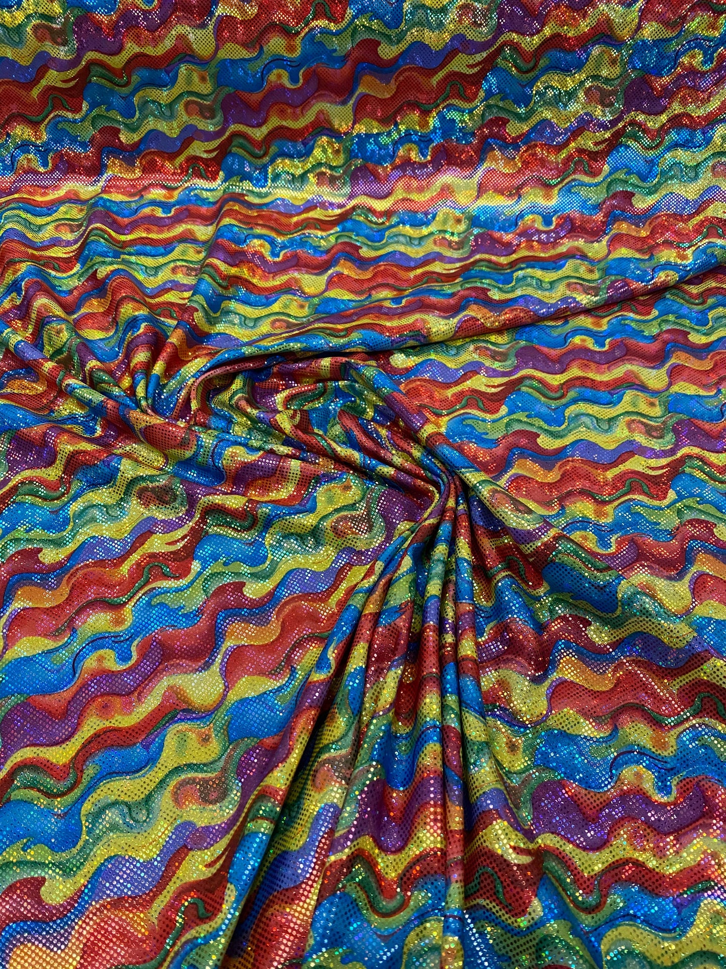 New shattered glass hologram multicolor lava design nylon spandex 4way stretch 58/60” Sold by the YD. Ships worldwide from Los Angeles CA US