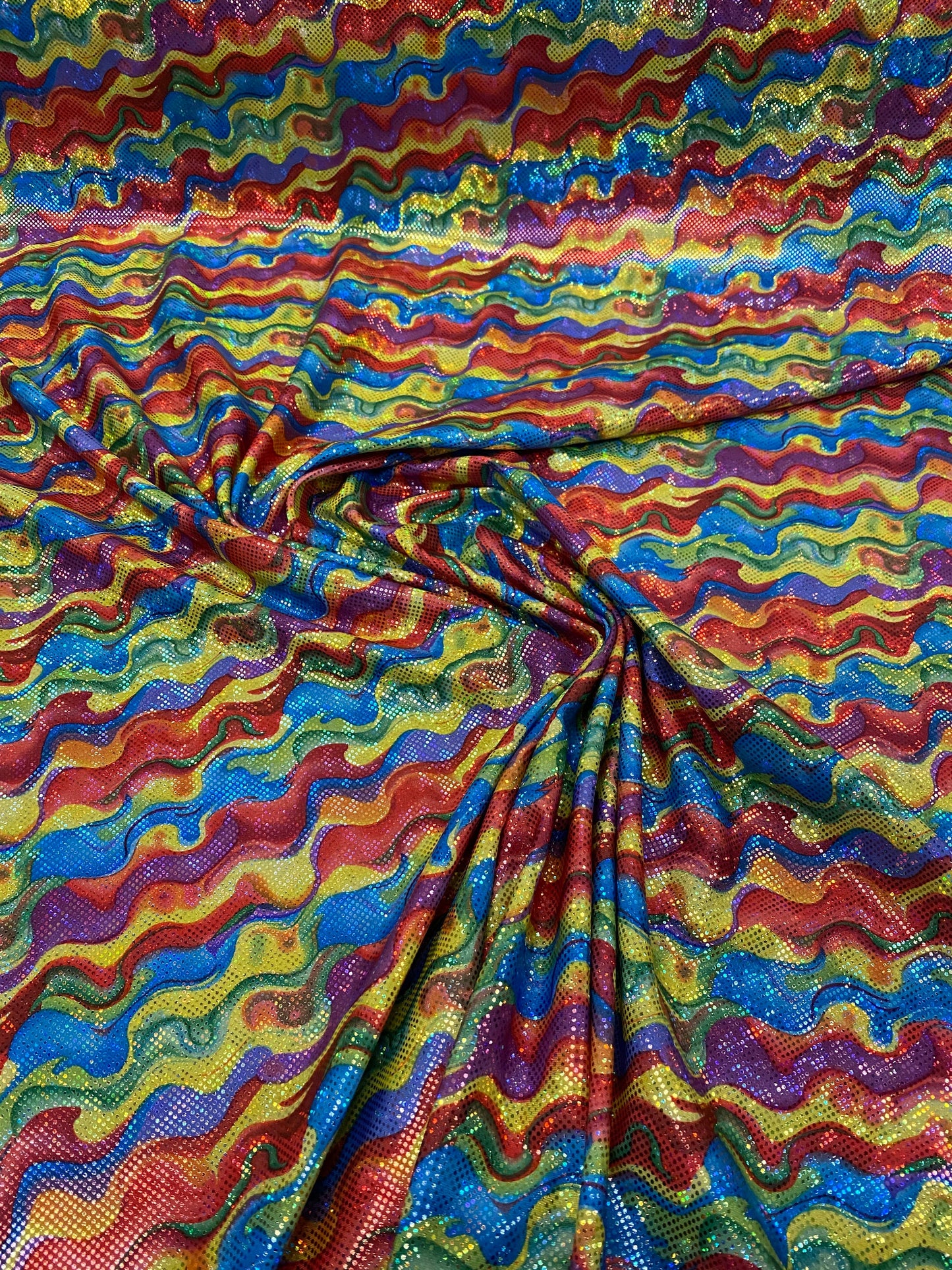 New shattered glass hologram multicolor lava design nylon spandex 4way stretch 58/60” Sold by the YD. Ships worldwide from Los Angeles CA US