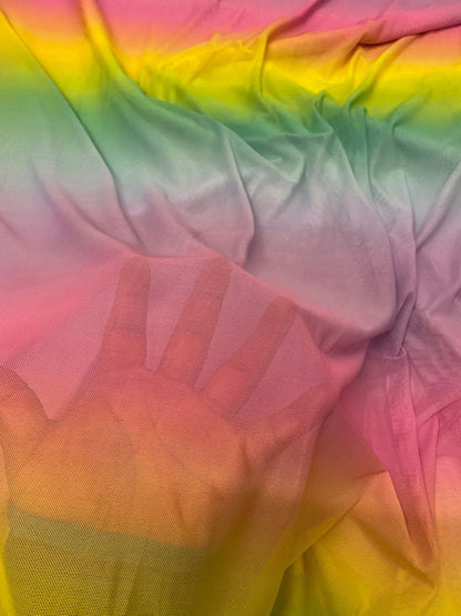 New rainbow design power mesh 4-way stretch nylon quality 58/60” Sold by the YD. Ships worldwide from Los Angeles California USA.