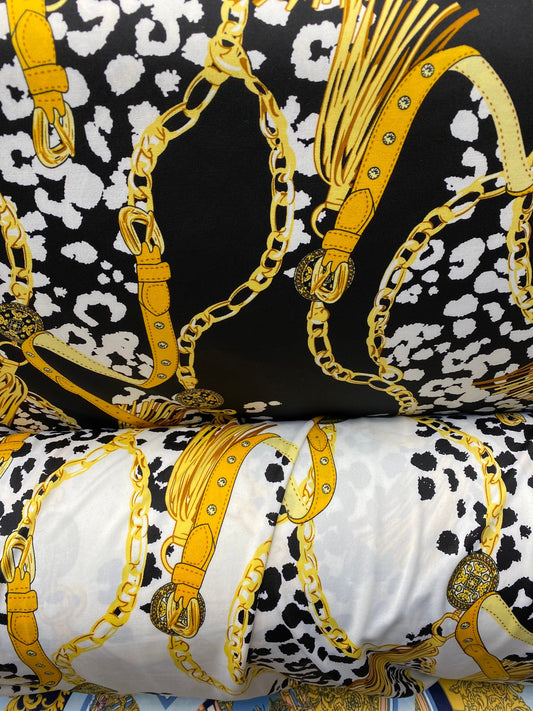 New animal print with gold chain design print on poly spandex 2-way stretch medium weight 58/60” Sold by the YD. Ships worldwide from USA.