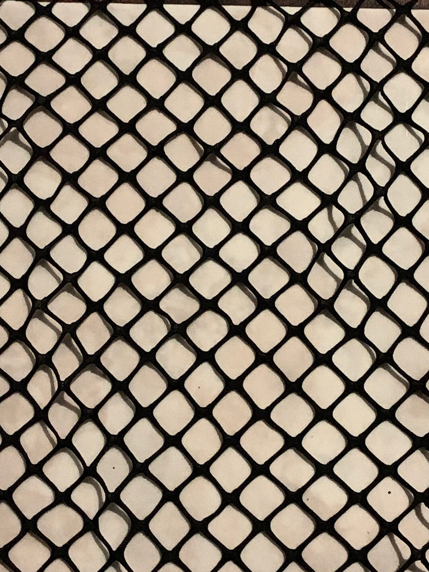 New Fishnet jumbo size black spandex mesh 4-way 58/60” Sold by the YD. Ships worldwide from Los Angeles California USA.