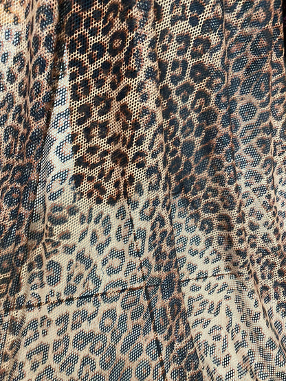 New fishnet exotic leopard design 2-way stretch 58/60” Sold by the YD. Ships worldwide from Los Angeles California USA.