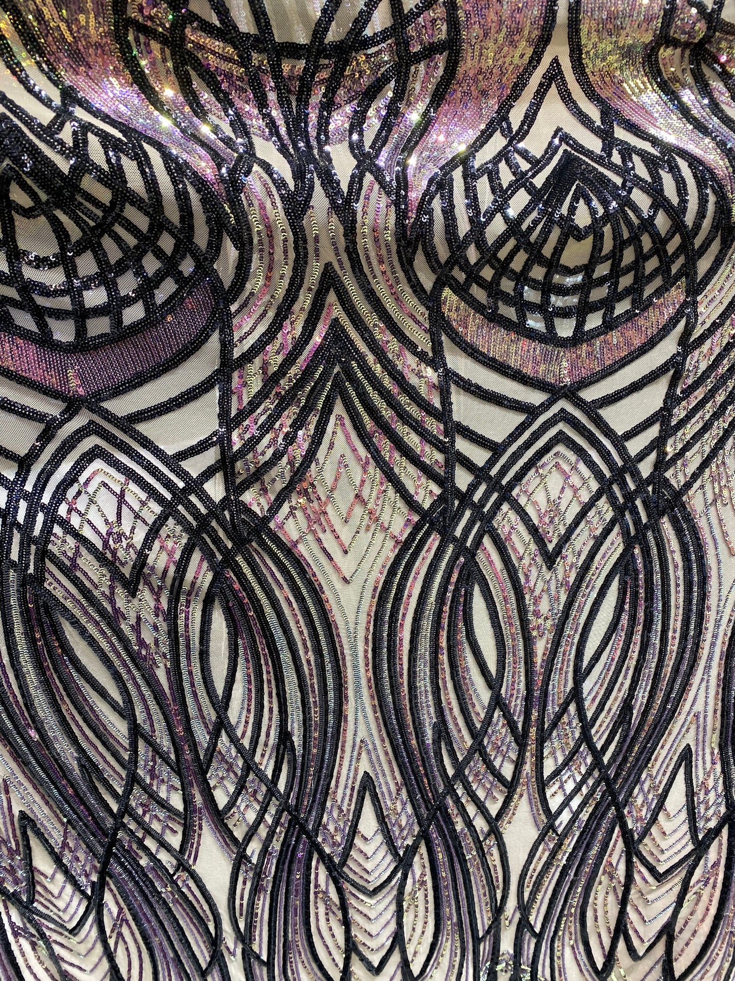 New Modern Beyonce design power mesh with Iridescent sequins 2-way stretch 55/57” Sold by the YD. Ships worldwide from Los Angeles CA USA.