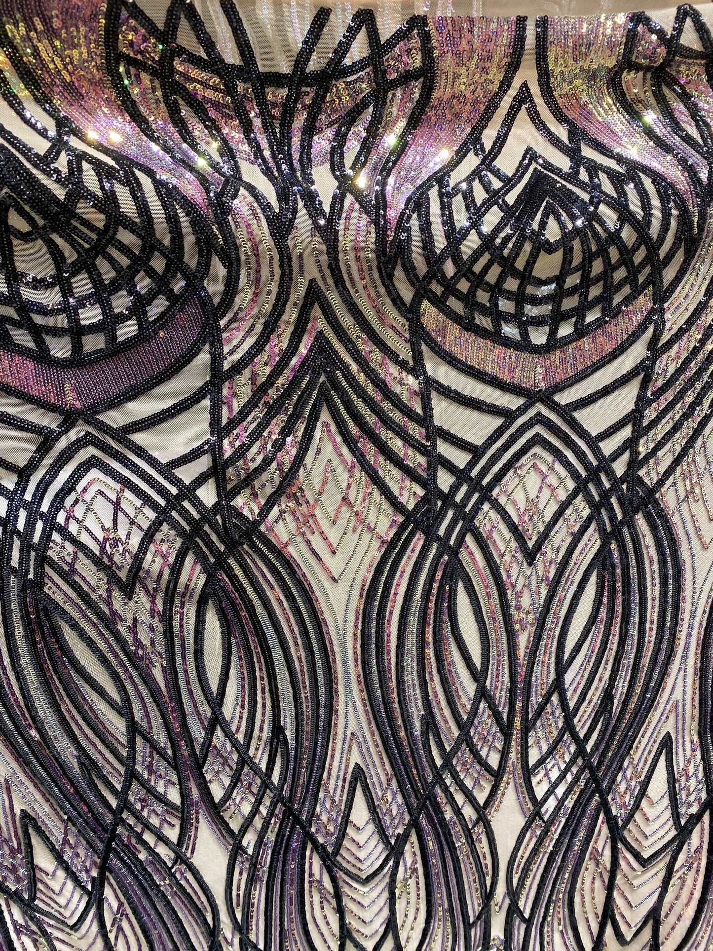 New Modern Beyonce design power mesh with Iridescent sequins 2-way stretch 55/57” Sold by the YD. Ships worldwide from Los Angeles CA USA.