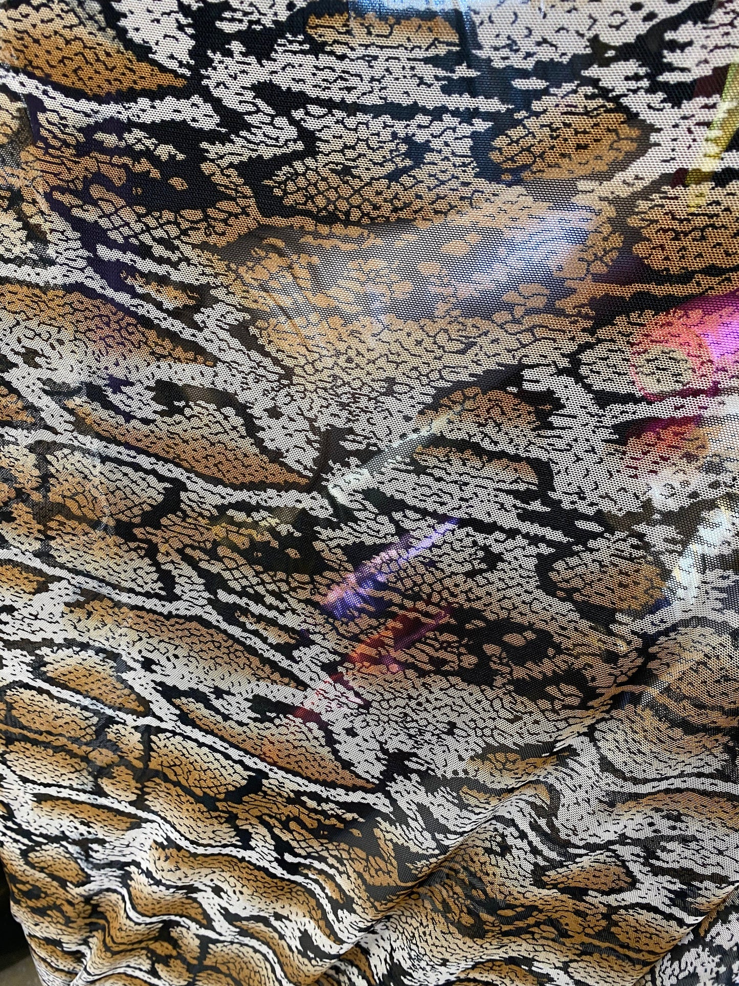 New mesh snake design print on stretch mesh 4-way Sold by the YD. Ships worldwide from Los Angeles California USA.