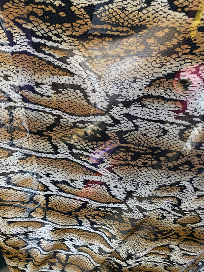 New mesh snake design print on stretch mesh 4-way Sold by the YD. Ships worldwide from Los Angeles California USA.