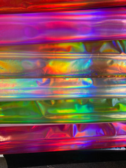 New Luxury Iridescent vinyl medium weight 2-way stretch 58/60”Sold by the YD. Ships worldwide from Los Angeles California USA.